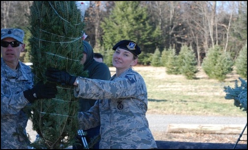 National Guard troops lend a hand in loading Trees for Troops. (Photo: Public Domain)