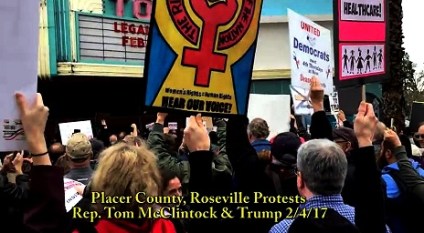 screenshot-anti-trump-protests-at-townhalls-465-x-258